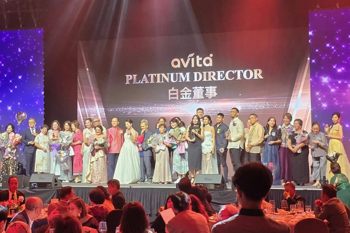 avita Platinum Director recognition ceremony — leaders on stage