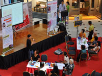 Joey speaking at the Millenia Walk Atrium